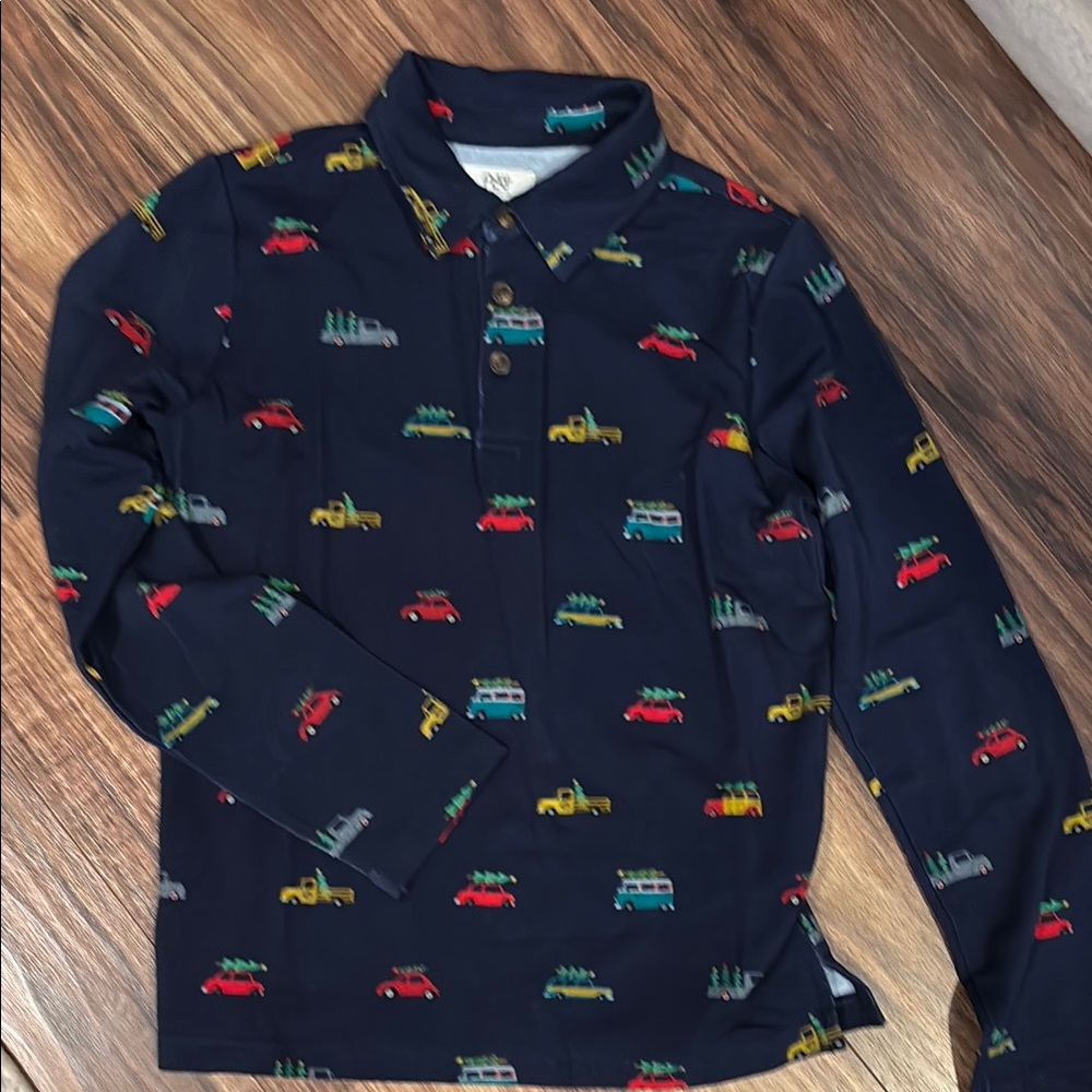 Little Sleepies Play navy shirt with cars/trucks and Christmas’s trees.